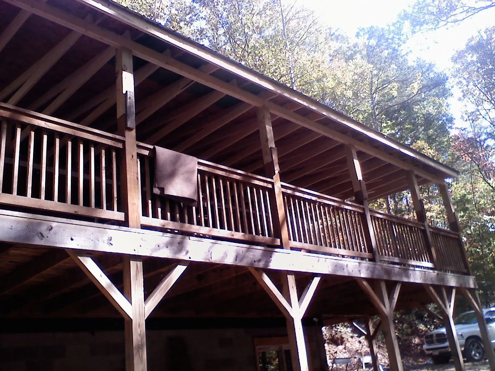Timber framing under a new elevated porch and deck — Roof Leak Repair in Alden by Roofing Brothers